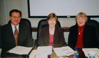 Alice working with Triangle Transit Authority Board of Trustees members Bill Strom and Carter Worthy