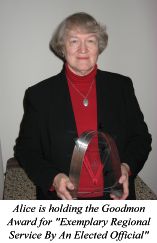 Alice is holding the Goodmon Award for Exemplary Regional Service By An Elected Official
